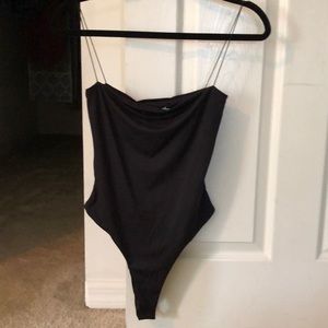 Meshki NWT Leila black bodysuit in size small.